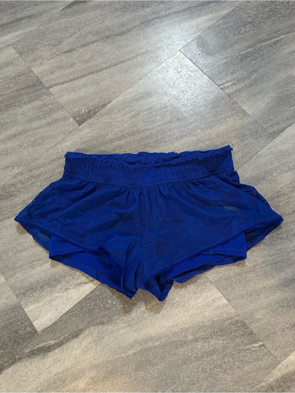 Lululemon Blue running shorts with subtle geometric pattern
Size 6